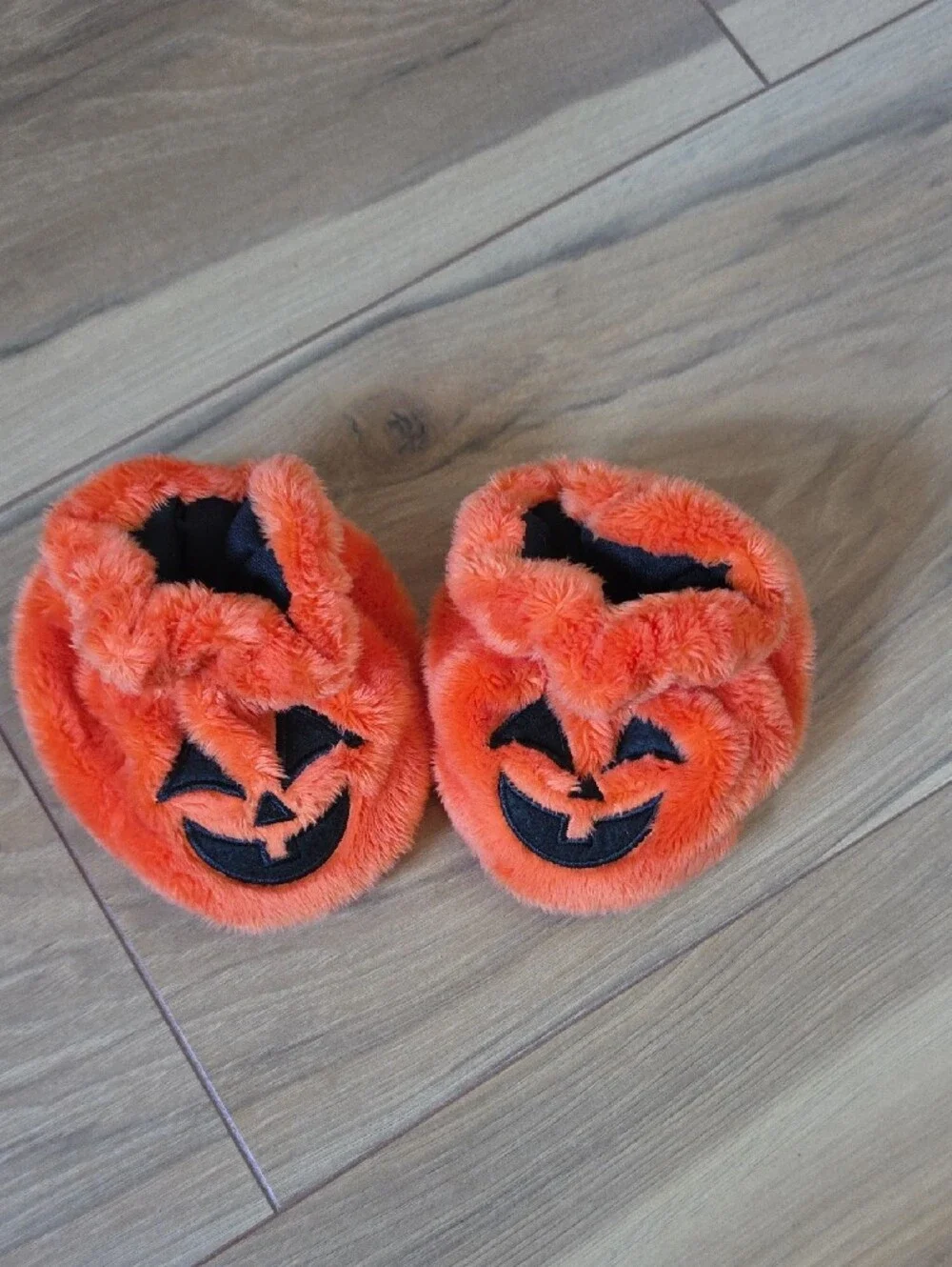 Orange Fuzzy Pumpkin Slippers with Jack-O'-Lantern Faces